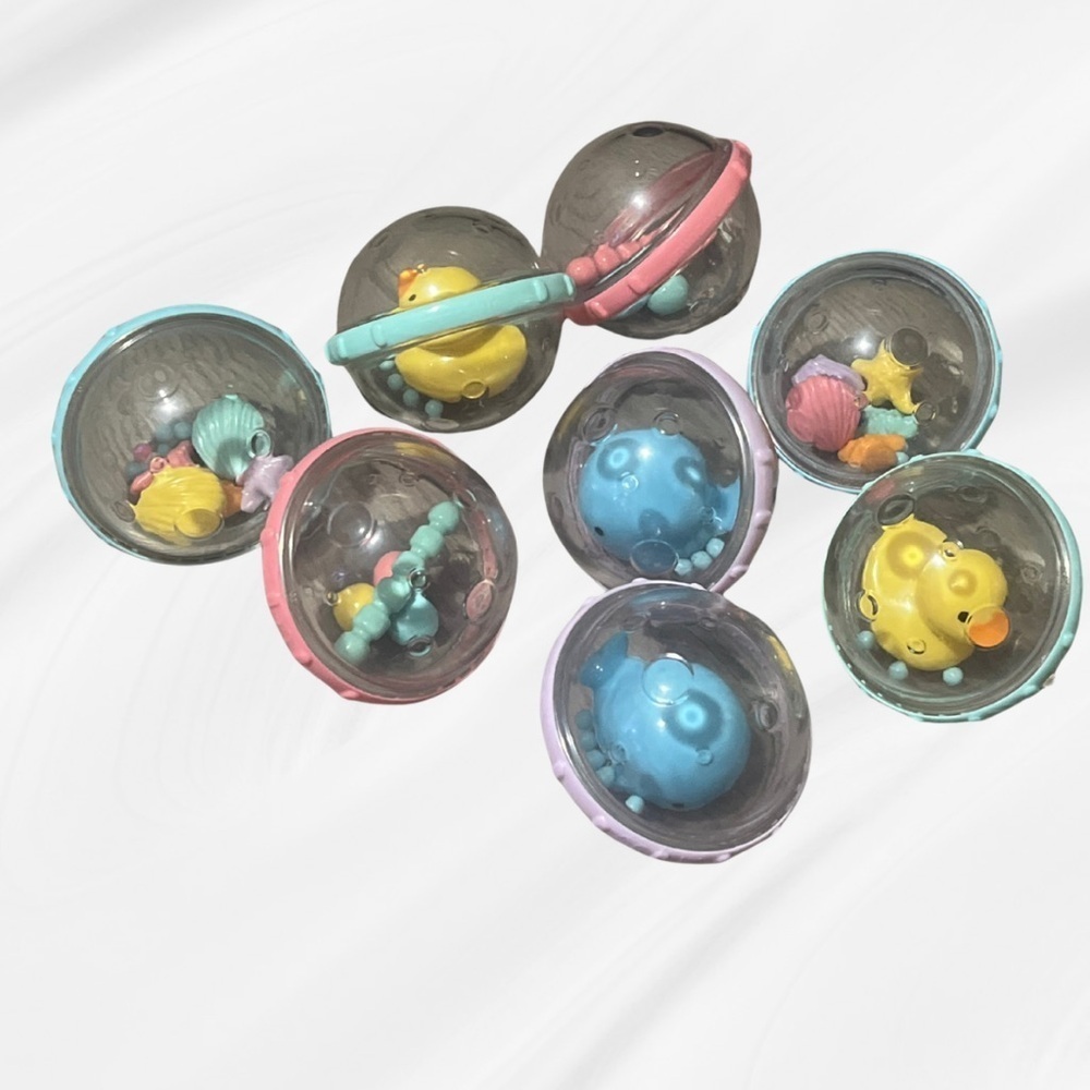 Munchkin Float & Play Bubbles Baby Bath Toy Set (8-Pack) Rattle Spin